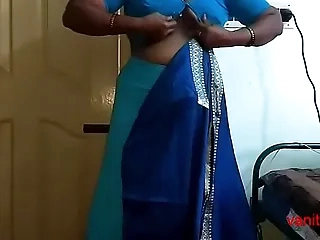 desi Indian  tamil aunty telugu aunty kannada aunty  malayalam aunty Kerala aunty hindi bhabhi horny cheating wife vanitha wearing saree showing big boobs and shaved honeypot Aunty Changing Dress ready be useful to party and Making Video